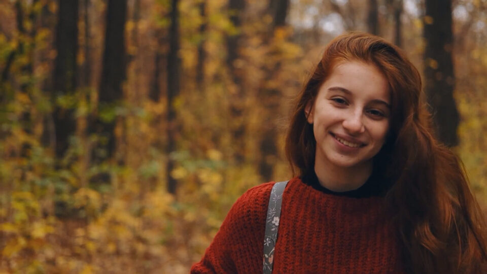 A young learner outdoors, from the Career Navideer families introduction